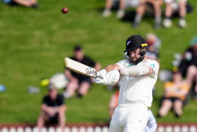 New Zealand's Michael Rae plays a shot during day two of the 2nd international Test cricket match between New Zealand and West Indies at the Basin reserve in Wellington on December 11, 2025. (Photo by Marty MELVILLE / AFP)
