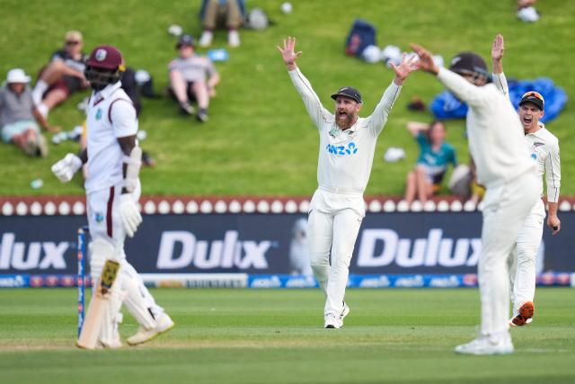 New Zealand's Kane Williamson (C) appeals for a LBW call on West Indies' Anderson Phillip (L) during day two of the 2nd international Test cricket match between New Zealand and West Indies at the Basin reserve in Wellington on December 11, 2025. (Photo by Marty MELVILLE / AFP)