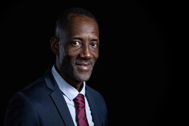 La France Insoumise (LFI) candidate for mayor of Saint Denis, Bally Bagayoko poses during a photo session in Paris, on December 11, 2025. (Photo by JULIEN DE ROSA / AFP)