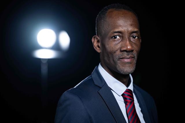 La France Insoumise (LFI) candidate for mayor of Saint Denis, Bally Bagayoko poses during a photo session in Paris, on December 11, 2025. (Photo by JULIEN DE ROSA / AFP)