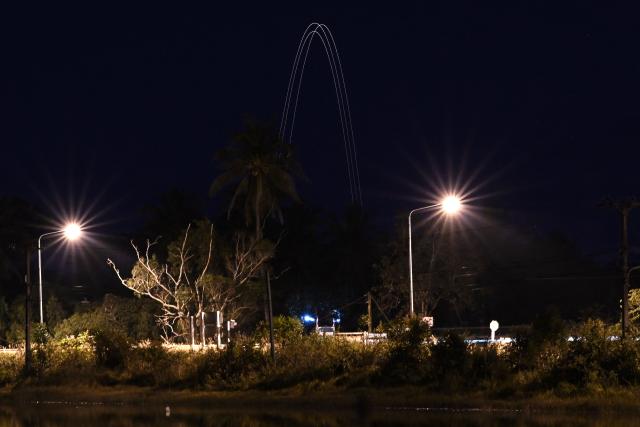 Cambodian rockets are fired towards the Thai border province of Surin on December 11, 2025, amid clashes along the Thai-Cambodia border. Renewed fighting raged at the border of Cambodia and Thailand on December 11, with combat heard near centuries-old temples, ahead of an expected phone call from US President Donald Trump to the two nations' leaders. (Photo by Lillian SUWANRUMPHA / AFP)