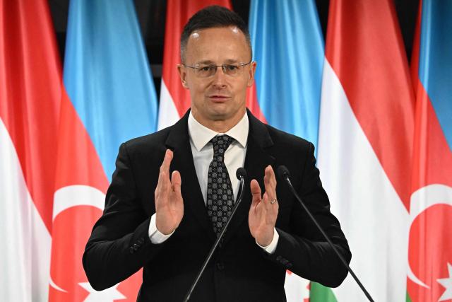Hungary's Foreign Minister Peter Szijjarto addresses a joint press conference with his Azerbaijani counterpart in the Bozsik Arena of Budapest, on December 11, 2025. Bayramov pays a working visit to the Hungarian capital, including meetings with Hungarian officials and the third Azerbaijan–Hungary Strategic Dialogue. (Photo by Attila KISBENEDEK / AFP)