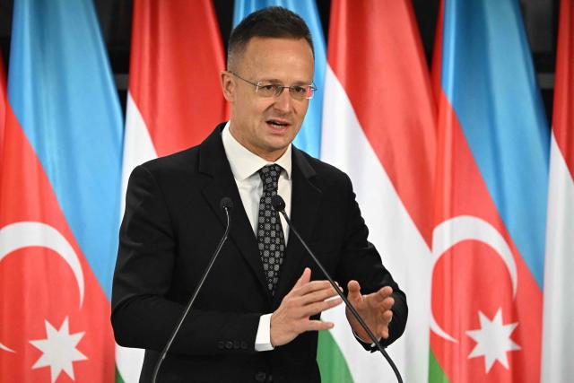 Hungary's Foreign Minister Peter Szijjarto addresses a joint press conference with his Azerbaijani counterpart in the Bozsik Arena of Budapest, on December 11, 2025. Bayramov pays a working visit to the Hungarian capital, including meetings with Hungarian officials and the third Azerbaijan–Hungary Strategic Dialogue. (Photo by Attila KISBENEDEK / AFP)