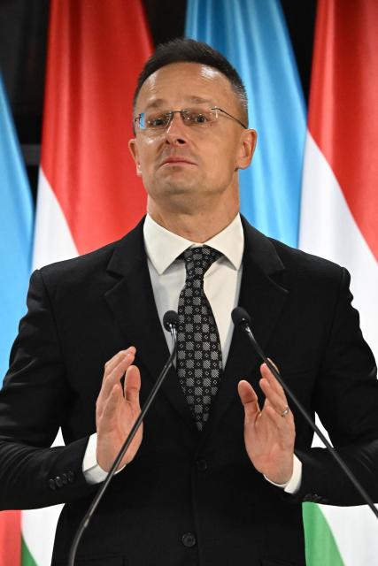 Hungary's Foreign Minister Peter Szijjarto addresses a joint press conference with his Azerbaijani counterpart in the Bozsik Arena of Budapest, on December 11, 2025. Bayramov pays a working visit to the Hungarian capital, including meetings with Hungarian officials and the third Azerbaijan–Hungary Strategic Dialogue. (Photo by Attila KISBENEDEK / AFP)