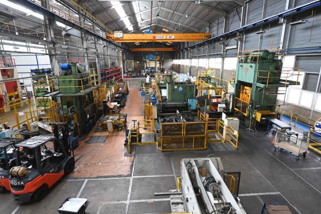 This photo shows an interior view of a Brandt factory at a standstill, following the announcement of the group's immediate liquidation in Vendome, western France, on December 11, 2025. On December 11, 2025, the courts ordered the liquidation of the century-old household appliance group Brandt, a French industrial flagship that is disappearing, leaving some 700 employees unemployed on the eve of Christmas, some of whom gathered at midday to express their “anger.” (Photo by JEAN-FRANCOIS MONIER / AFP)