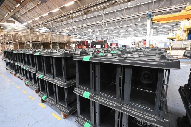 This photo shows an interior view of a Brandt factory at a standstill, following the announcement of the group's immediate liquidation in Vendome, western France, on December 11, 2025. On December 11, 2025, the courts ordered the liquidation of the century-old household appliance group Brandt, a French industrial flagship that is disappearing, leaving some 700 employees unemployed on the eve of Christmas, some of whom gathered at midday to express their “anger.” (Photo by JEAN-FRANCOIS MONIER / AFP)