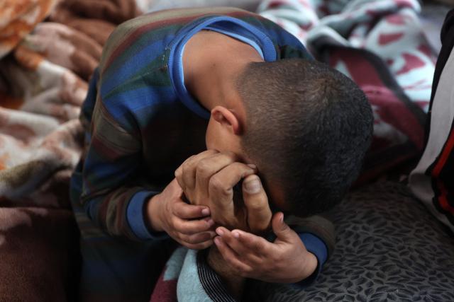 AFP PICTURES OF THE YEAR 2025

A boys mourns over the body of a loved one killed in overnight Israeli bombardment on northen Gaza, at the Ahli Arab Hospital, also known as the Maamadani (Baptist) Hospital, in Gaza City on April 3, 2025. (Photo by Omar AL-QATTAA / AFP) / AFP PICTURES OF THE YEAR 2025