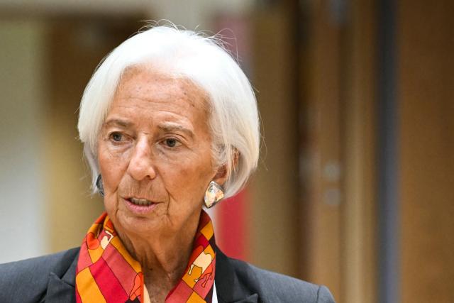 European Central Bank (ECB) President Christine Lagarde reacts upon arrival for a meeting with finance ministers of the Eurozone to elect the new Eurogroup President and discuss the overall budgetary situation and the prospects of euro area, at the European Commission, in Brussels, on December 11, 2025. (Photo by NICOLAS TUCAT / AFP)
