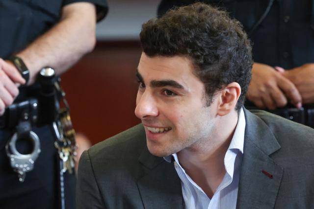 Luigi Mangione appears in Manhattan Supreme Court during an evidentiary hearing in the murder case of United Healthcare CEO Brian Thompson, in New York, on December 11, 2025. (Photo by William Farrington / POOL / AFP)