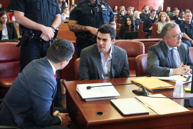 Luigi Mangione (C) appears in Manhattan Supreme Court during an evidentiary hearing in the murder case of United Healthcare CEO Brian Thompson, in New York, on December 11, 2025. (Photo by Jefferson Siegel / POOL / AFP)