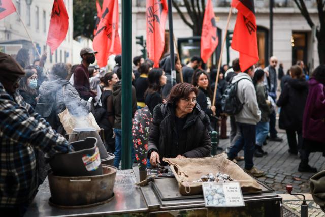 Protestors take part in a demonstration during a general strike against a labour code reform project, called by the country's two main unions in Lisbon on December 11, 2025. Widespread disruption hit Portuguese air travel and trains, hospitals and schools as the unions called the biggest nationwide strike action for more than a decade, protesting against a draft law aiming to simplify firing procedures, extend the length of fixed-term contracts and expand the minimum services required during a strike. (Photo by PATRICIA DE MELO MOREIRA / AFP)