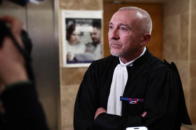 Laurent-Franck Lienard, lawyer of Patrick Giovannoni, speaks to journalists after the verdict on the final day of the trial for the murder of Antoine Sollacaro and the attempted murder of Charles Cervoni at the Bouches-du-Rhône Assize Court in Aix-en-Provence, southern France, on December 11, 2025. A 30-year prison sentence with a 20-year minimum term was handed down on December 11, 2025, against Bacchiolelli, accused of being the gunman, in the trial over the 2012 killing of lawyer Antoine Sollacaro in Ajaccio, on December 11, 2025. Ettori, prosecuted for repeat criminal association and on the run since 2020, is sentenced to 15 years in prison.
Giovanonni, France's first repentant, prosecuted for criminal association in another attempted murder joined to the Sollacaro trial, was sentenced to a five-year suspended prison term. (Photo by Thibaud MORITZ / AFP)