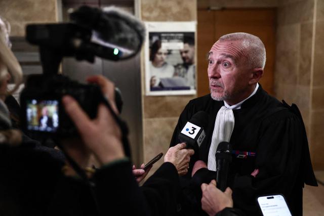 Laurent-Franck Lienard, lawyer of Patrick Giovannoni, speaks to journalists after the verdict on the final day of the trial for the murder of Antoine Sollacaro and the attempted murder of Charles Cervoni at the Bouches-du-Rhône Assize Court in Aix-en-Provence, southern France, on December 11, 2025. A 30-year prison sentence with a 20-year minimum term was handed down on December 11, 2025, against Bacchiolelli, accused of being the gunman, in the trial over the 2012 killing of lawyer Antoine Sollacaro in Ajaccio, on December 11, 2025. Ettori, prosecuted for repeat criminal association and on the run since 2020, is sentenced to 15 years in prison.
Giovanonni, France's first repentant, prosecuted for criminal association in another attempted murder joined to the Sollacaro trial, was sentenced to a five-year suspended prison term. (Photo by Thibaud MORITZ / AFP)
