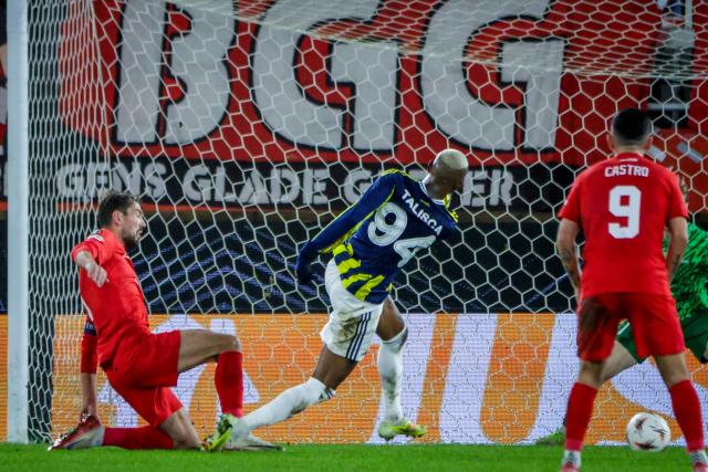 Fenerbahce's Brazilian midfielder #94 Anderson Talisca (C) celebrates his 0-3 during the UEFA Europa League first round - day 6 football match between SK Brann and Fenerbahce in Bergen, Norway on December 11, 2025. (Photo by Paul S. Amundsen / NTB / AFP) / Norway OUT