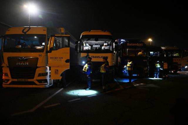 French gendarmes inspect trucks during a control operation against drug trafficking at the A63 motorway tollbooth in Castets, south-western France on December 11, 2025. (Photo by Gaizka IROZ / AFP)