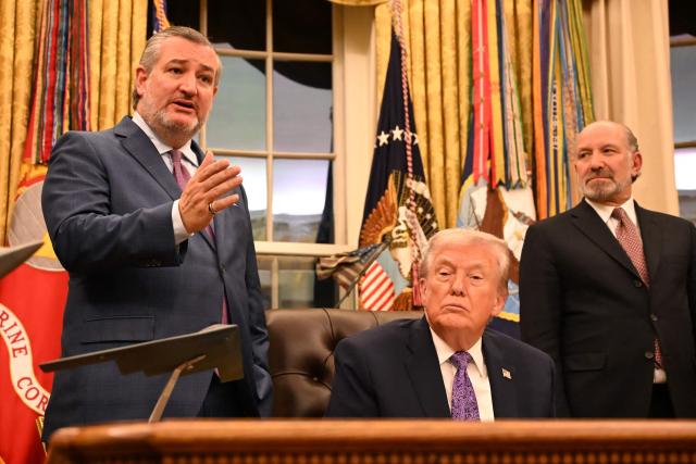 US President Donald Trump (C) and US Secretary of Commerce Howard Lutnick (R) listen as US Senator Ted Cruz (R-TX) (L) speaks during a signing ceremony on the Oval Office of the White House in Washington, DC, on December 11, 2025. (Photo by Alex WROBLEWSKI / AFP)