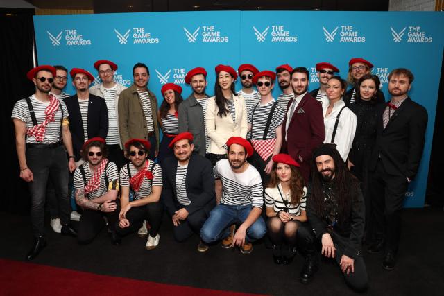 Members of the "Clair Obscur: Expedition 33" team, a role-playing video game developed by French studio Sandfall Interactive, pose as they arrive to attend The Game Awards at the Peacock Theater in Los Angeles, California, on December 11, 2025. (Photo by Michael Tran / AFP)
