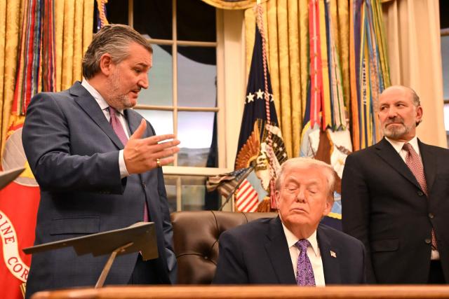 US President Donald Trump (C) and US Secretary of Commerce Howard Lutnick (R) listen as US Senator Ted Cruz (R-TX) (L) speaks during a signing ceremony on AI the Oval Office of the White House in Washington, DC, on December 11, 2025. (Photo by Alex WROBLEWSKI / AFP)
