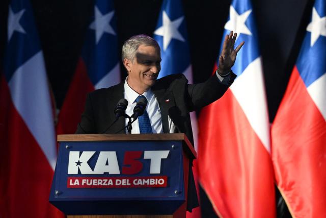 Chile's presidential candidate Jose Antonio Kast of the Republican Party waves to supporters during his closing campaign rally in Temuco, Chile on December 11, 2025. The second round of the Chilean presidential election on December 14 will pit two candidates against each other who are diametrically opposed: Jeannette Jara, the representative of a broad left-wing coalition with modest origins, and the far-right leader Jose Antonio Kast, an ultraconservative Catholic determined to massively expel undocumented migrants. (Photo by EITAN ABRAMOVICH / AFP)