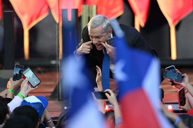 Chile's presidential candidate Jose Antonio Kast of the Republican Party gestures during his closing campaign rally in Temuco, Chile on December 11, 2025. The second round of the Chilean presidential election on December 14 will pit two candidates against each other who are diametrically opposed: Jeannette Jara, the representative of a broad left-wing coalition with modest origins, and the far-right leader Jose Antonio Kast, an ultraconservative Catholic determined to massively expel undocumented migrants. (Photo by EITAN ABRAMOVICH / AFP)