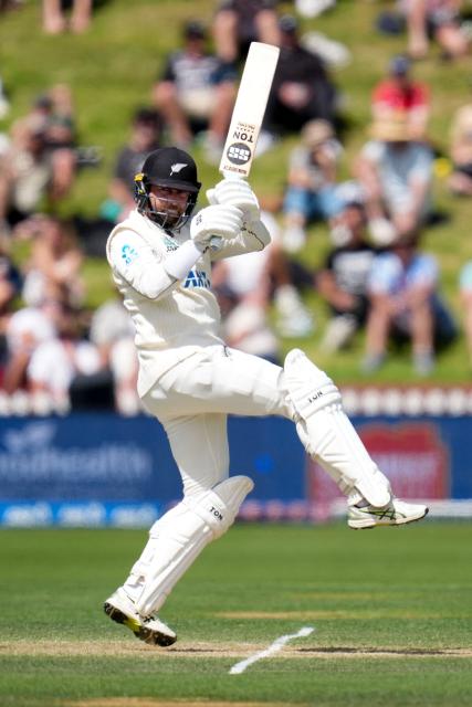New Zealand's Devon Conway plays a shot during day three of the 2nd international Test cricket match between New Zealand and West Indies at the Basin reserve in Wellington on December 12, 2025. (Photo by Marty MELVILLE / AFP)