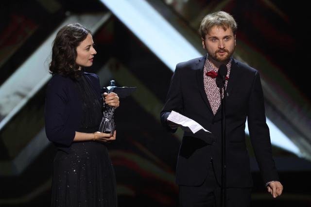 French singer Alice Duport-Percier (L) and Lorien Testard, composer of the soundtrack of the video game Clair Obscur: Expedition 33, accept the award for Best Score and Music during The Game Awards at the Peacock Theater in Los Angeles, California, on December 11, 2025. (Photo by Michael Tran / AFP)
