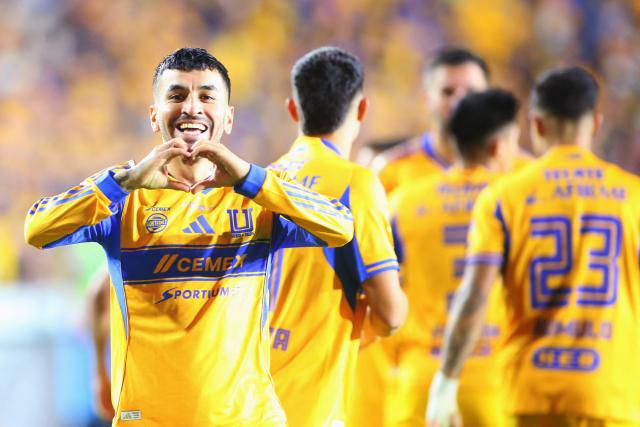 Tigres' Argentine forward #07 Angel Correa celebrates after scoring the opening goal during the Liga MX Apertura final first leg football match between Tigres and Toluca at the UANL University Stadium in San Nicolas de los Garza, Nuevo Leon State, Mexico on December 11, 2025. (Photo by Julio Cesar AGUILAR / AFP)