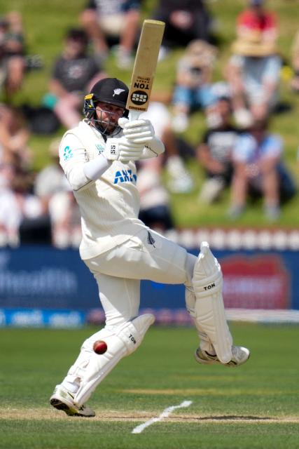 New Zealand's Devon Conway plays a shot during day three of the 2nd international Test cricket match between New Zealand and West Indies at the Basin reserve in Wellington on December 12, 2025. (Photo by Marty MELVILLE / AFP)