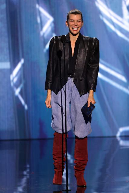 US actress Milla Jovovich presents an award during The Game Awards at the Peacock Theater in Los Angeles, California, on December 11, 2025. (Photo by Michael Tran / AFP)