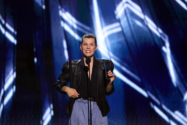 US actress Milla Jovovich presents an award during The Game Awards at the Peacock Theater in Los Angeles, California, on December 11, 2025. (Photo by Michael Tran / AFP)