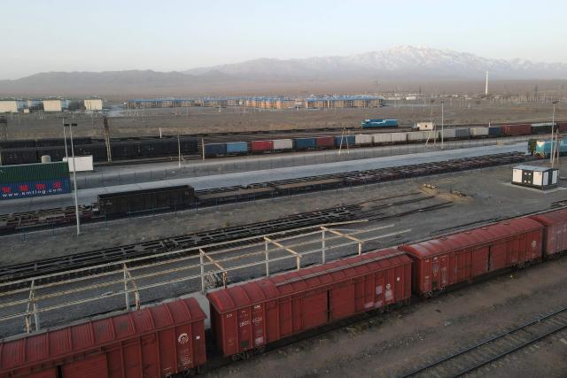 An aerial view shows the railway station of Dostyk at the Kazakh-Chinese border, a key hub for trade between China and Europe through Central Asia, on November 19, 2025. (Photo by Ruslan PRYANIKOV / AFP)