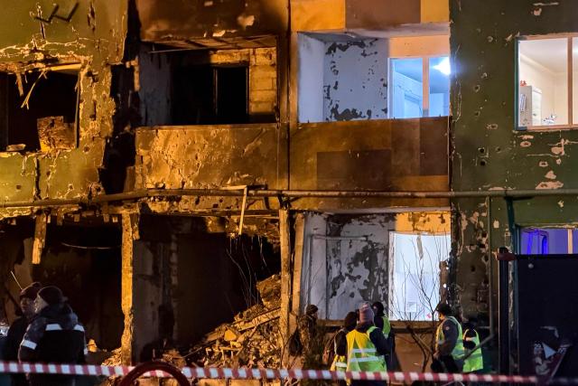 A view of a damaged residential building following a drone attack in Tver on December 12, 2025. (Photo by Tatyana MAKEYEVA / AFP)