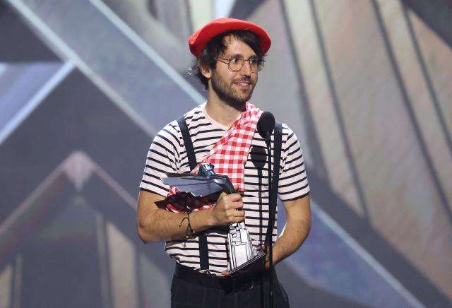 Guillaume Broche, creator of the video game "Clair Obscur: Expedition 33", accepts the award for Game of The Year during The Game Awards at the Peacock Theater in Los Angeles, California, on December 11, 2025. (Photo by Michael Tran / AFP)