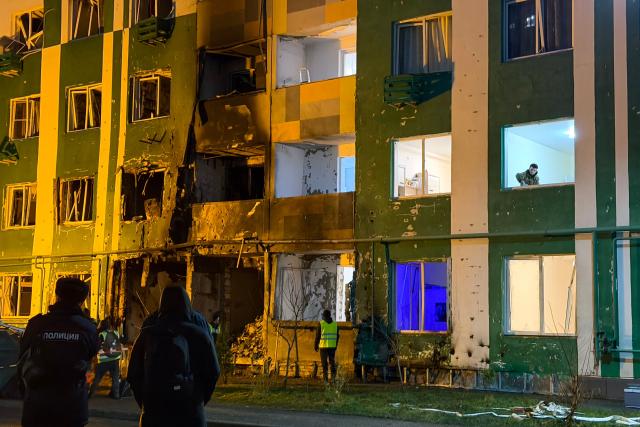 A view of a damaged residential building following a drone attack in Tver on December 12, 2025. (Photo by Tatyana MAKEYEVA / AFP)