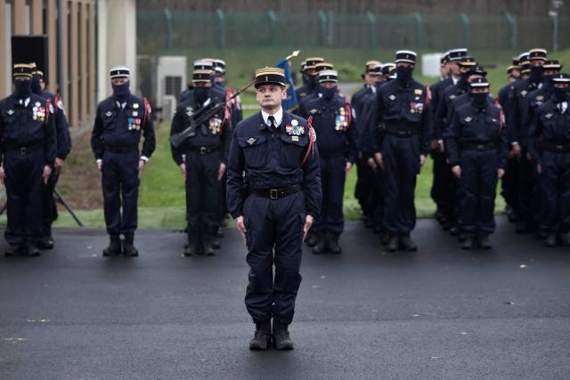 Colonel Benoit Villeminoz attends a ceremony to officially take command as new commander of the National Gendarmerie Intervention Group (GIGN) in Versailles, west of Paris on December 12, 2025. (Photo by STEPHANE DE SAKUTIN / AFP)