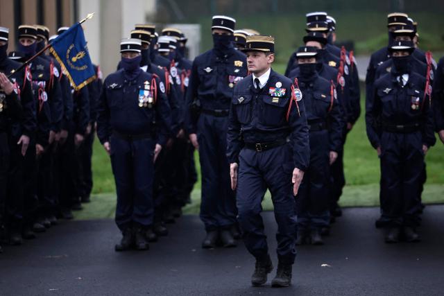Colonel Benoit Villeminoz attends a ceremony to officially take command as new commander of the National Gendarmerie Intervention Group (GIGN) in Versailles, west of Paris on December 12, 2025. (Photo by STEPHANE DE SAKUTIN / AFP)