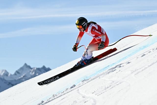 Switzerland's Jasmina Suter competes in the women's downhill race part of the FIS Alpine Ski World Cup 2025-2026, in St Moritz, south-eastern Switzerland on December 12, 2025. (Photo by Fabrice COFFRINI / AFP)