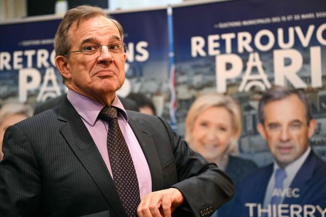 France's far-right Rassemblement National (RN) MEP Thierry Mariani gestures during a press conference held as a candidate for the upcoming 2026 municipal elections, in Paris on December 12, 2025. (Photo by Bertrand GUAY / AFP)
