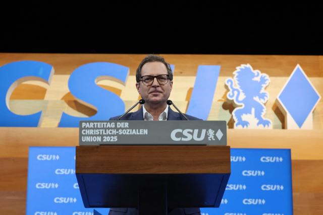 General Secretary of the Bavarian conservative Christian Social Union (CSU) party Martin Huber delivers his speech during a congress of the Christian Social Union (CSU) party on December 12, 2025 in Munich, southern Germany. (Photo by Alexandra BEIER / AFP)