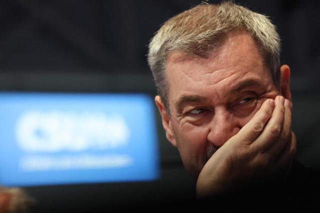 Bavaria's State Premier and leader of the conservative Christian Social Union (CSU) Markus Soeder is seen as he arrives to a congress of the Christian Social Union (CSU) party on December 12, 2025 in Munich, southern Germany. (Photo by Alexandra BEIER / AFP)