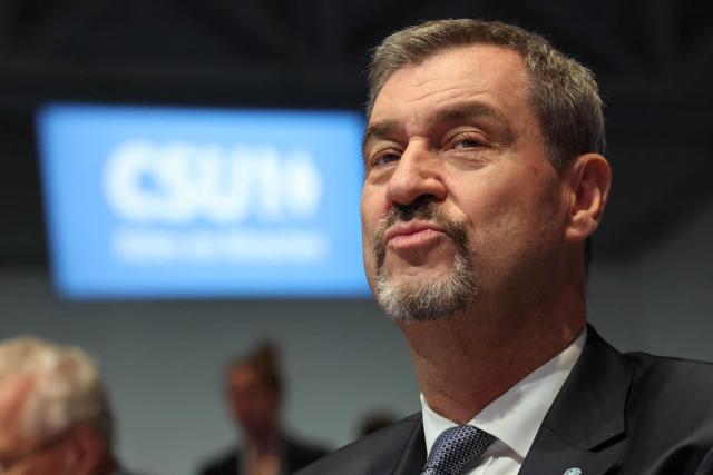 Bavaria's State Premier and leader of the conservative Christian Social Union (CSU) Markus Soeder is seen as he arrives to a congress of the Christian Social Union (CSU) party on December 12, 2025 in Munich, southern Germany. (Photo by Alexandra BEIER / AFP)