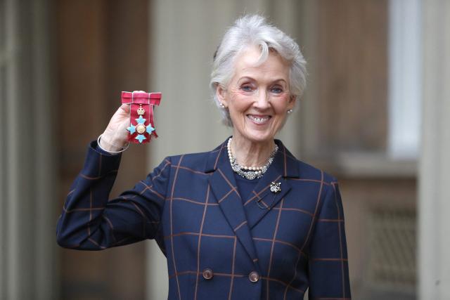 (FILES) British author Joanna Trollope poses with her medal after she was made a Commander of the Order of the British Empire (CBE) for services to literature during an investiture ceremony at Buckingham Palace in London on December 19, 2019. Bestselling author Joanna Trollope -- renowned for her so-called "Aga sagas" set in rural England -- has died at the age of 82, her family said on December 12, 2025. (Photo by Andrew Matthews / POOL / AFP)