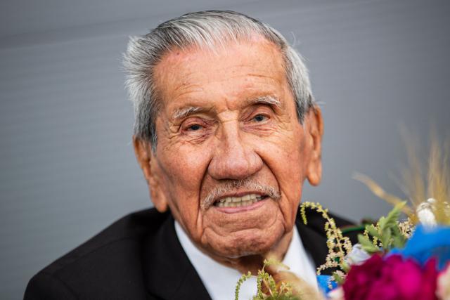 (FILES) US veteran Charles N Shay, who was a medic in the 16th Infantry Regiment 1st Infantry Division, arrives at the Deauville-Normandie Airport in Saint-Gatien-des-Bois, northwestern France, on June 2, 2022, as part of a group of 29 US World War II veterans attending official celebrations for the 78th D-Day anniversary, marking the WWII Normany landings of June 6, 1944. The funeral of Charles Norman Shay, who died at the age of 101 on December 3 and was presented as the last Native American survivor of the June 6, 1944 landings, took place December 12, 2025, morning at Bayeux Cathedral, according to the diocese. (Photo by Sameer Al-DOUMY / AFP)
