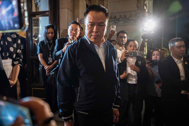 Thailand's Prime Minister Anutin Charnvirakul (C) reacts during a press conference at Government House in Bangkok on December 12, 2025, after his call with US President Donald Trump. Thailand's prime minister dissolved parliament on December 12, paving the way for general elections early next year as deadly border clashes continue with neighbour Cambodia. (Photo by Chanakarn Laosarakham / AFP)