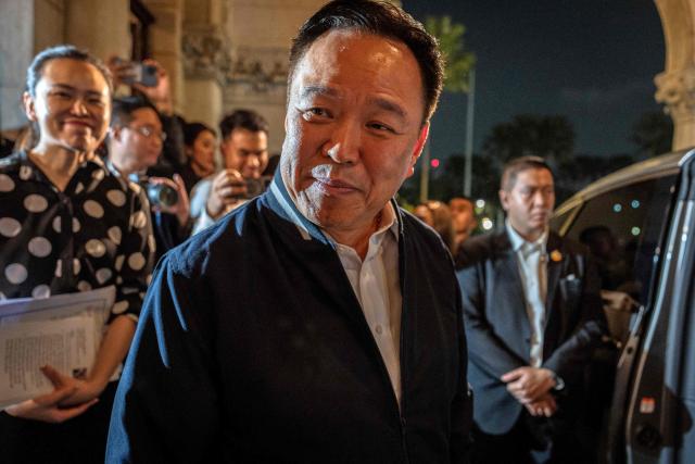 Thailand's Prime Minister Anutin Charnvirakul (C) reacts during a press conference at Government House in Bangkok on December 12, 2025, after his call with US President Donald Trump. Thailand's prime minister dissolved parliament on December 12, paving the way for general elections early next year as deadly border clashes continue with neighbour Cambodia. (Photo by Chanakarn Laosarakham / AFP)