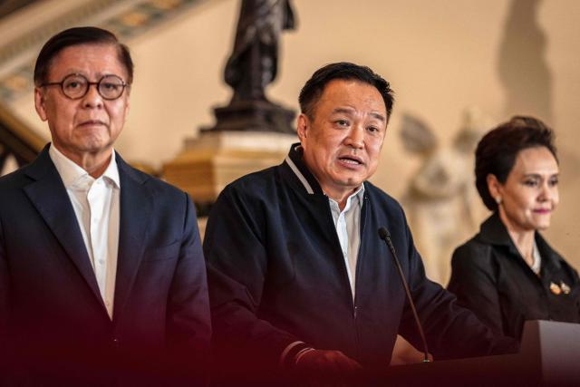 Thailand's Prime Minister Anutin Charnvirakul (C) speaks during a press conference at Government House in Bangkok on December 12, 2025, after his call with US President Donald Trump. Thailand's prime minister dissolved parliament on December 12, paving the way for general elections early next year as deadly border clashes continue with neighbour Cambodia. (Photo by Chanakarn Laosarakham / AFP)