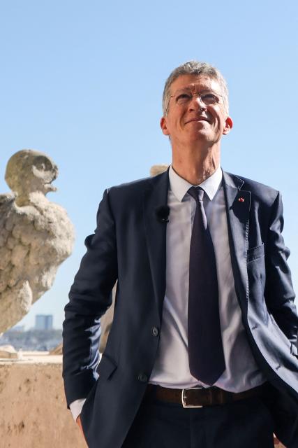 (FILES) President of the 'Rebatir Notre-Dame de Paris' public establishment Philippe Jost (looks on during a visit to Notre-Dame de Paris Cathedral during the inauguration ceremony of the new tour route of the Cathedral Towers Gothic structures destroyed following the April 2019 fire, as part of the 42nd edition of the European Heritage Days in Paris, on September 19, 2025. Philippe Jost, who heads the public body in charge of restoring Notre-Dame Cathedral, has been chosen to lead a mission with the Louvre’s management aimed at “thoroughly reorganizing the museum,” announced Minister Rachida Dati on December 12, 2025. (Photo by Ludovic MARIN / POOL / AFP)