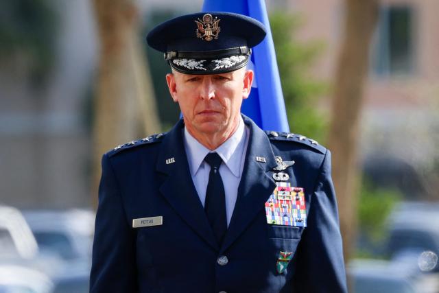 US Air Force Lt. Gen. Evan L. Pettus is seen during US Navy Adm. Alvin Holsey's relinquishment of command and retirement ceremony at US Southern Command (SOUTHCOM) headquarters in Doral, Florida, on December 12, 2025. The US admiral responsible for overseeing a major military buildup in the Caribbean and controversial strikes on alleged drug-smuggling boats stepped down on Friday just a year into his tenure. (Photo by Eva Marie UZCATEGUI / AFP)