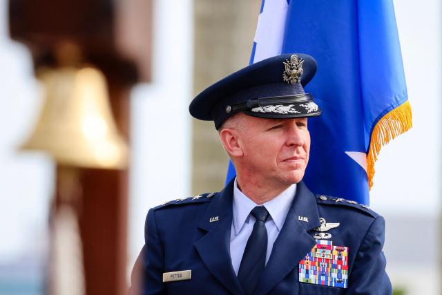 US Air Force Lt. Gen. Evan L. Pettus is seen during US Navy Adm. Alvin Holsey's relinquishment of command and retirement ceremony at US Southern Command (SOUTHCOM) headquarters in Doral, Florida, on December 12, 2025. The US admiral responsible for overseeing a major military buildup in the Caribbean and controversial strikes on alleged drug-smuggling boats stepped down on Friday just a year into his tenure. (Photo by Eva Marie UZCATEGUI / AFP)