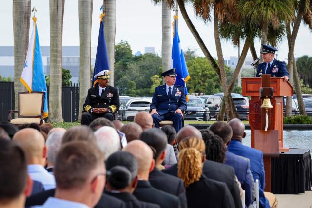 US Air Force Gen. Dan Caine, chairman of the Joint Chiefs of Staff, (R) speaks during the relinquishment of command and retirement ceremony for US Navy Adm. Alvin Holsey (L) at US Southern Command (SOUTHCOM) headquarters in Doral, Florida, on December 12, 2025. The US admiral responsible for overseeing a major military buildup in the Caribbean and controversial strikes on alleged drug-smuggling boats stepped down on Friday just a year into his tenure. (Photo by Eva Marie UZCATEGUI / AFP)
